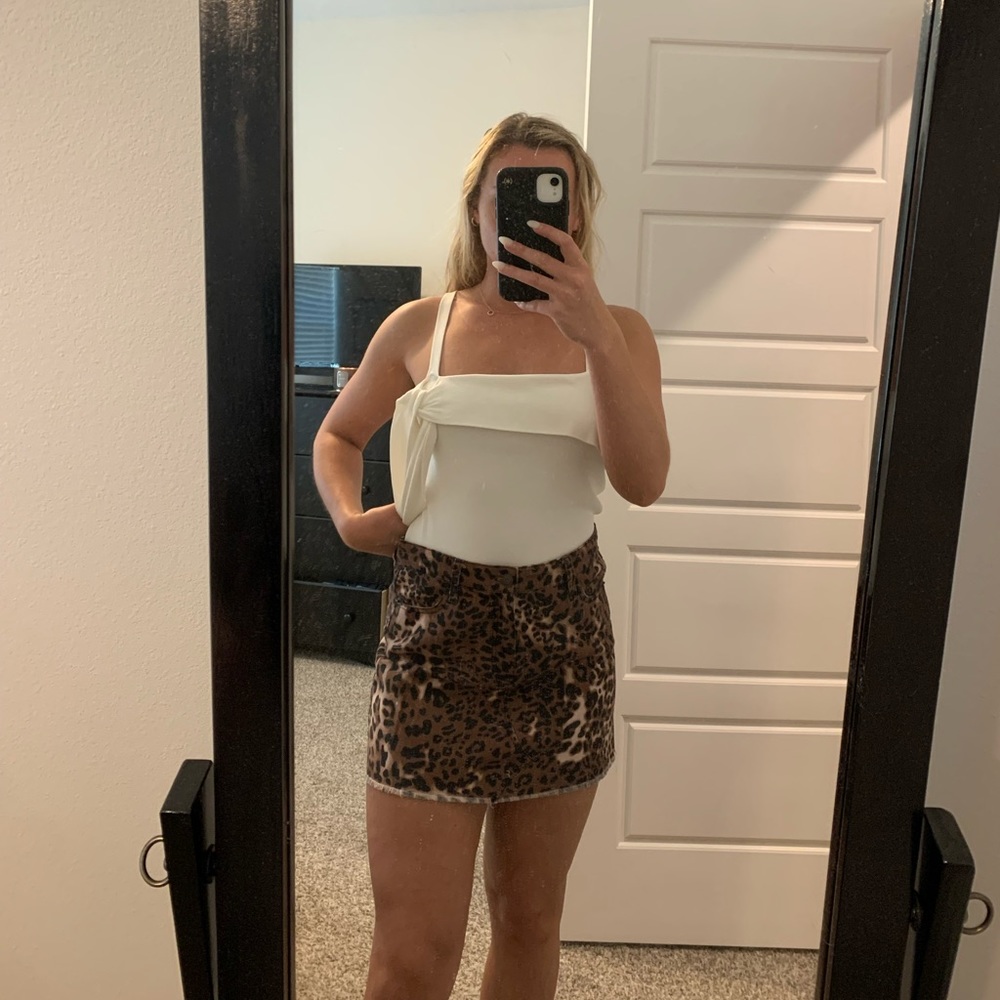 Cheetah print Peach Love skirt size small. Barely worn! Condition is like new.